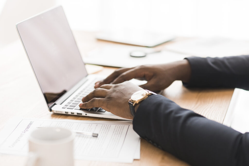 ethnic-hands-typing-laptop ethnic-hands-typing-laptop